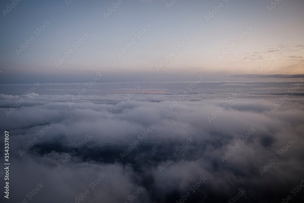 Clouds seen from a plane at dawn
