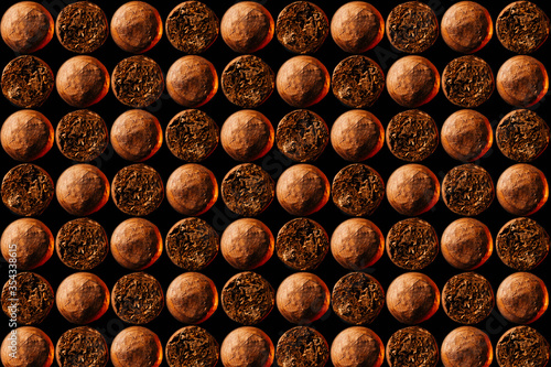 Cuban cigars look in front and behind a close-up pattern. The concept of the background, Horizontal layout