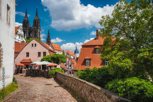 Meissen fable like old town with Albrechtsburg Castle. town Medieval buildings with orange tiled roofs. Dresden, Saxony, Germany. Sunny Day in Spring season