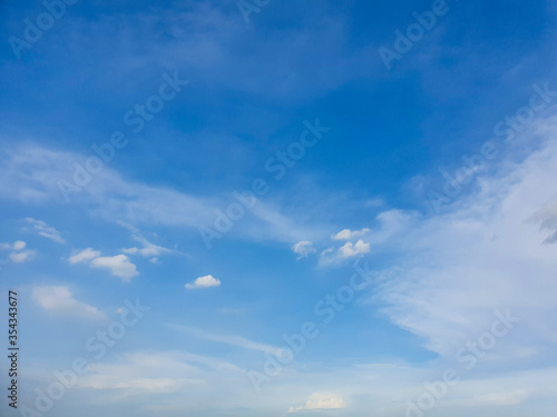 Fototapeta Naklejka Na Ścianę i Meble -  A clear blue sky with white clouds