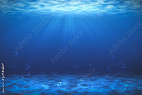 Sunbeam blue with bubbles deep sea or ocean underwater background.