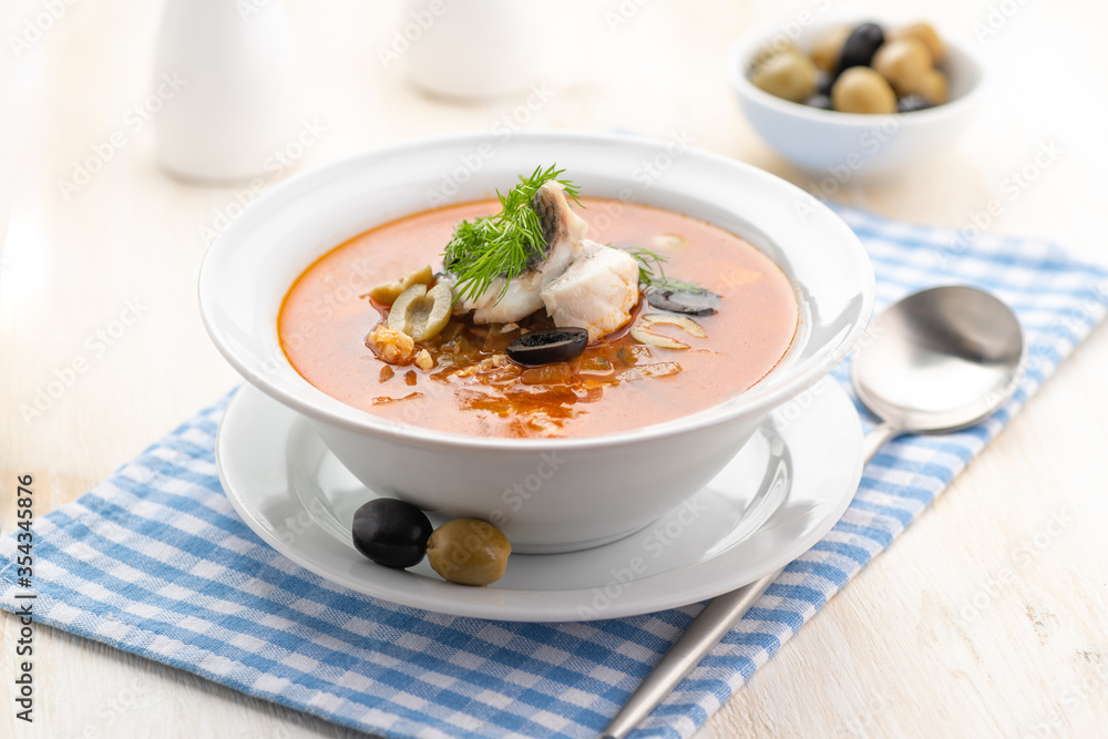 Fish soup with vegetables lemon and olives. Fish soup with vegetables lemon and olives.
