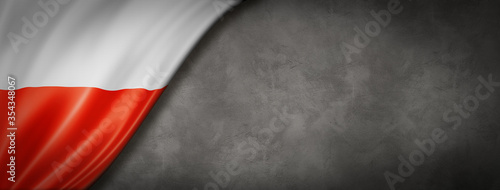 Polish flag on concrete wall banner