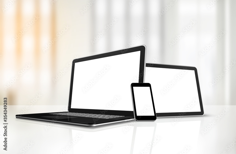 Laptop, mobile phone and digital tablet pc on office desk Laptop, mobile phone and digital tablet pc on office desk