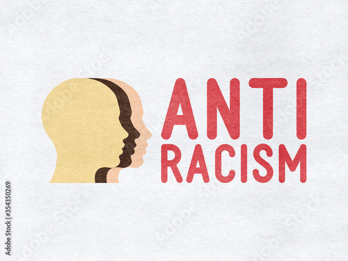 Anti-racism - Head and text on paper background. photo