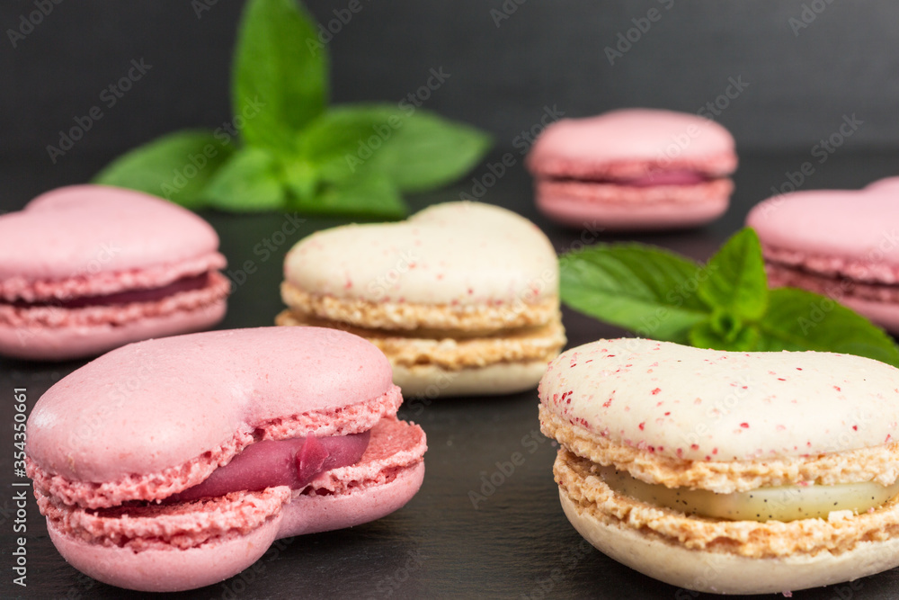 heart shaped macaroons  in pink and pale yellow with mint
