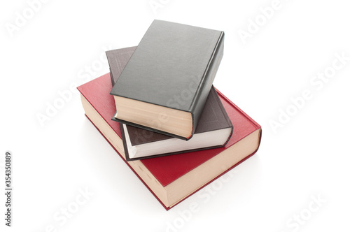 Stack of books with hardcovers on white background