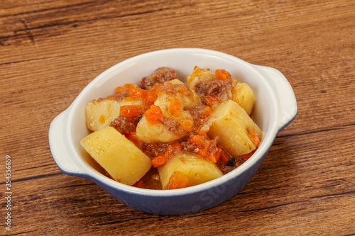 Roasted potato and beef with sauce