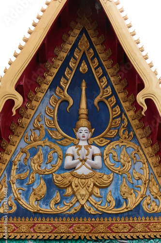 Decorative pediment showing a praying buddha image at a temple site in Siamese Lao PDR, Southeast Asia