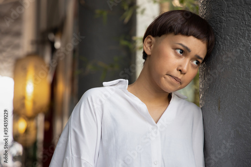 depressed, stressed, abused lgbt woman crying, concept of lgbt people being mistreated