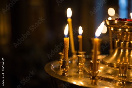 background of candles in christian orthodox church © Петр Смагин
