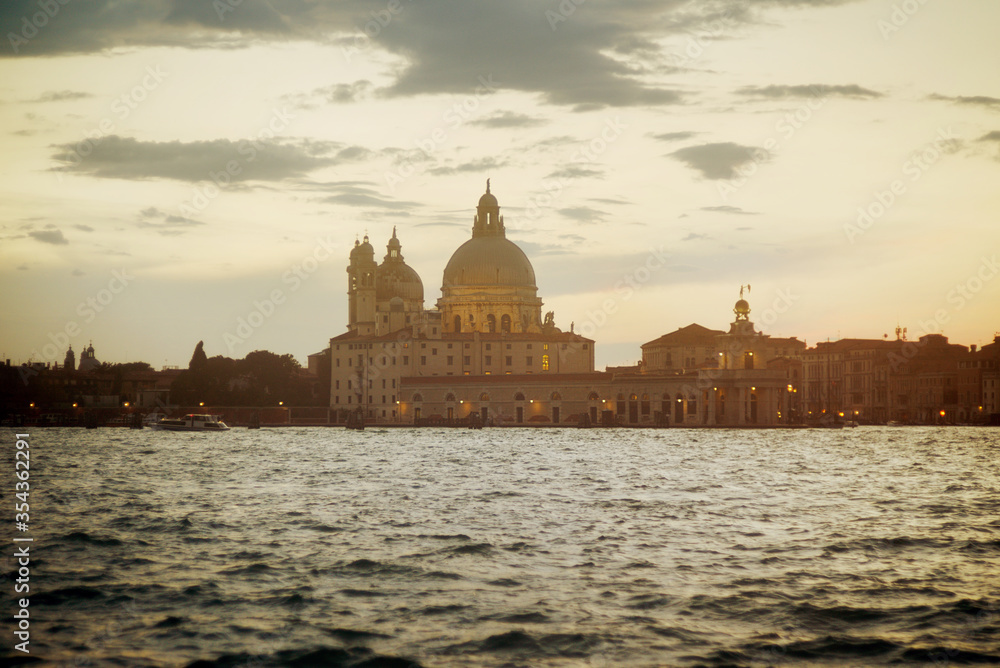 View of St. Mark's Basilica from the Grand Canal, Venice, Italy. St. Mark's Basilica in the evening.
