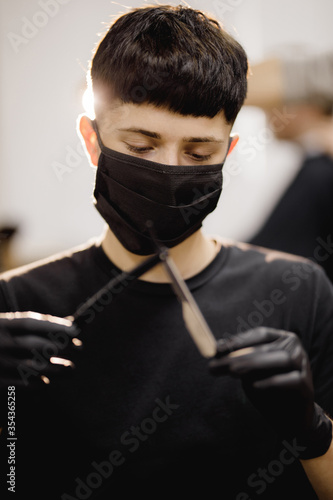 master barbershop with dangerous and sharp blade