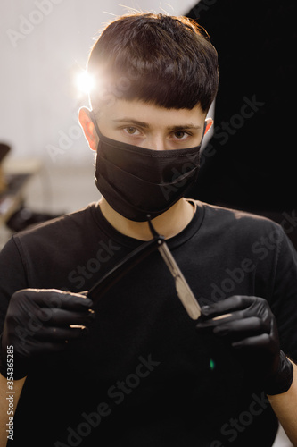 master barbershop with dangerous and sharp blade