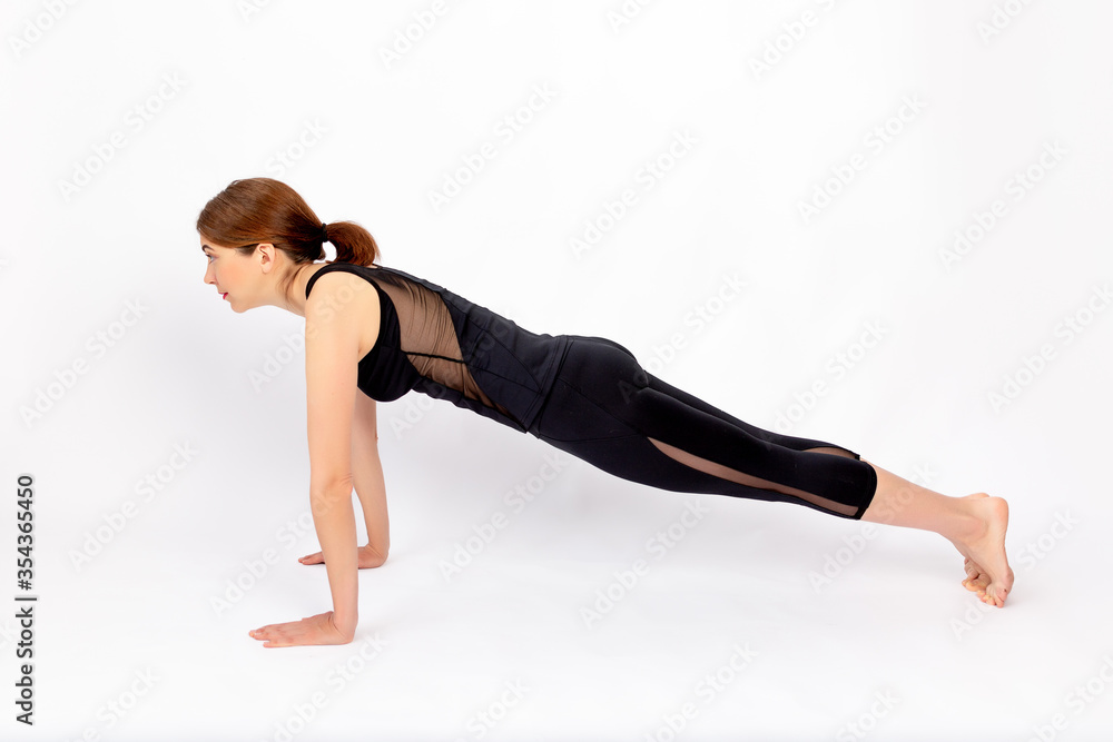 girl doing sports on a white background, healthy lifestyle, standing in the bar, weight loss, space for text girl doing sports on a white background, healthy lifestyle, standing in the bar, weight loss, space for text