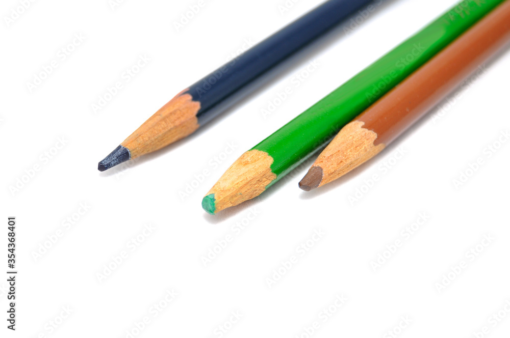 Colored pencils on a white background close up Colored pencils on a white background close up