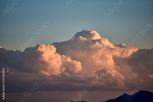 The sky with beautiful large thunderclouds above the mountain