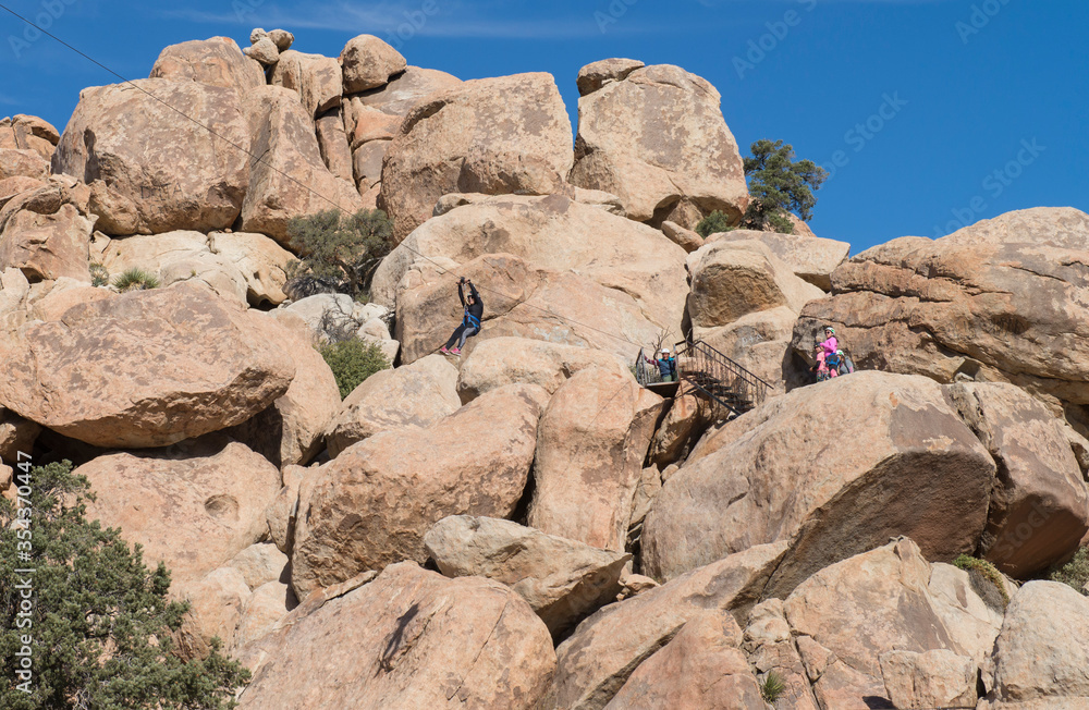 People on the mountains enjoying a zip line in La Rumorosa, Baja California. MEXICO, Extreme sports concept