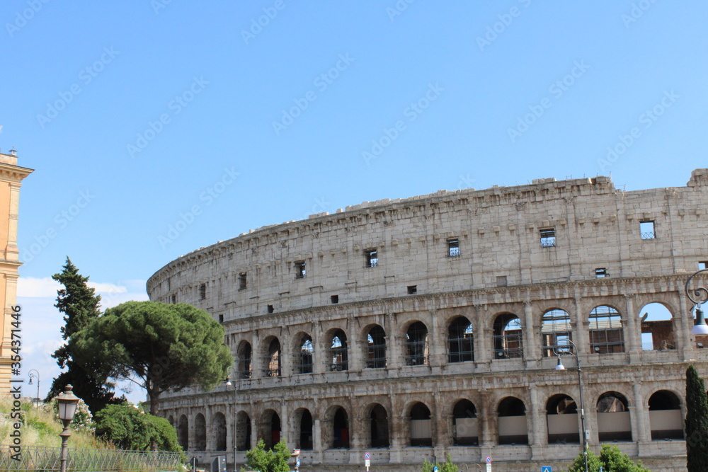Obraz premium colosseum in rome italy Colosseum in rome is among wonders of world and famous tourist destination and ancient amphitheater once used for gladiator fight 