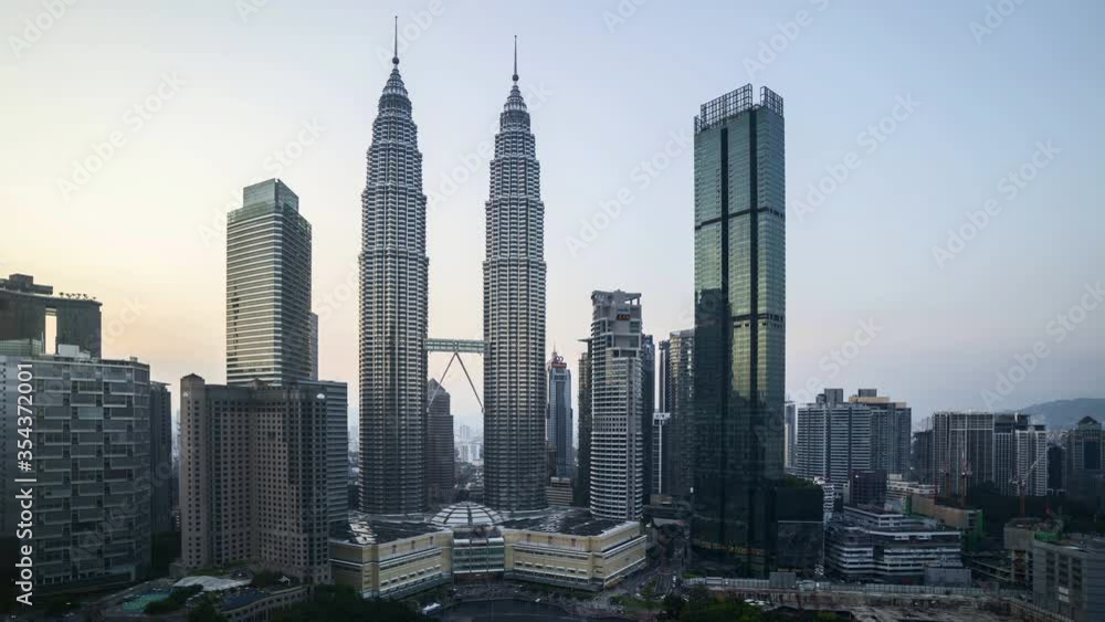 Kuala Lumpur, Malaysia - August 31, 2019: 4k time lapse of sunset at Kuala Lumpur capital city centre, Petronas Twin Towers KLCC. Kuala Lumpur, Malaysia - August 31, 2019: 4k time lapse of sunset at Kuala Lumpur capital city centre, Petronas Twin Towers KLCC.