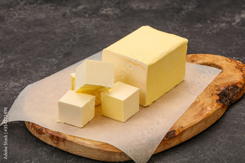 Bild auf Leinwand Dairy natural yellow butter piece