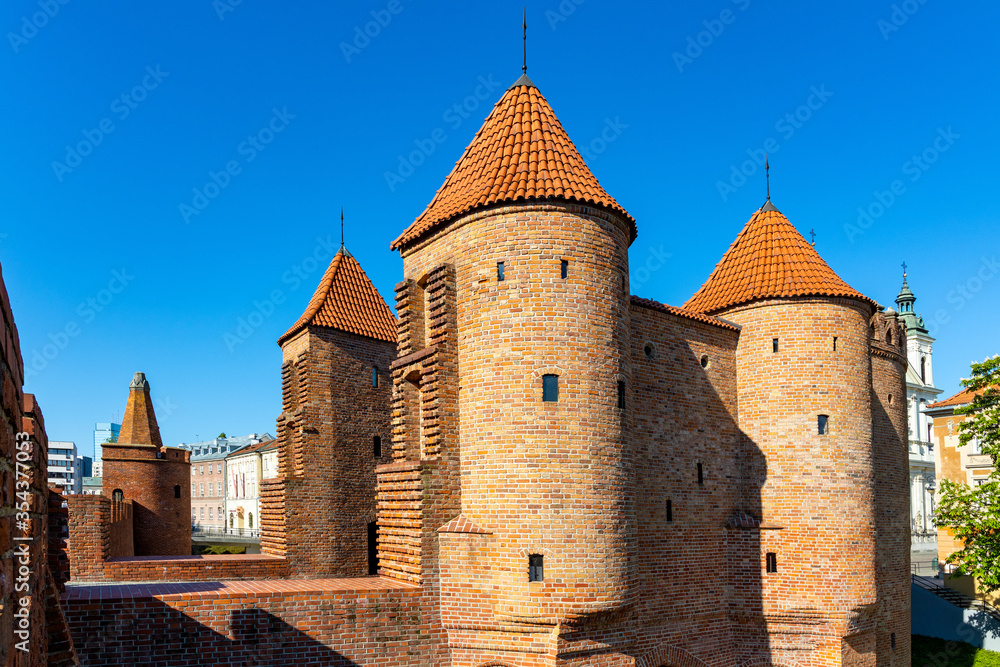 Warsaw Barbican fortified outpost as part of brick and stone historic defence walls in Stare Miasto Old Town quarter of Warsaw, Poland