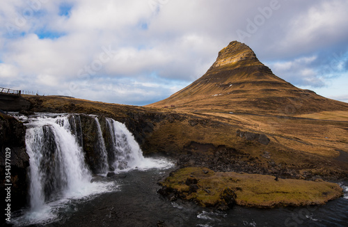 Kirkjufell mountain and the kirkjufellfoss waterfall Iceland