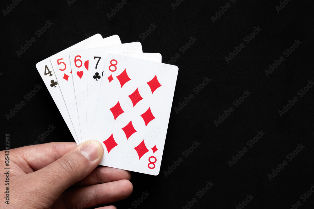 Straight combination in poker on black background. Poker  combinations concept.