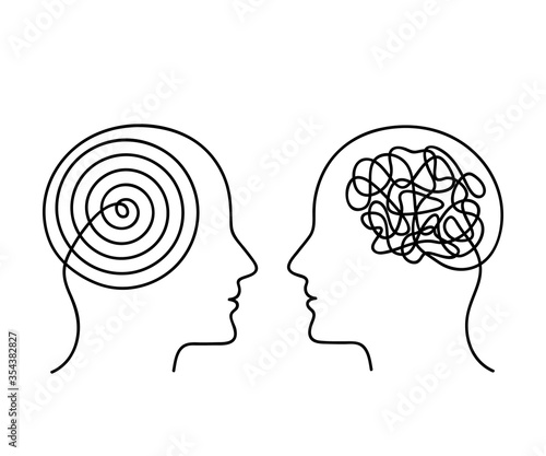 Two human heads with opposite thinking. the concept of chaos and order in thoughts.