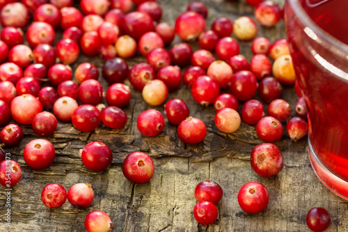 Cranberries and cranberry juice in a glass.Selective focus.