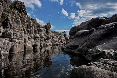 Los Elefantes cliffs landscape view in Mina Clavero, Córdoba, Argentina. The river flowing along the stone precipices.