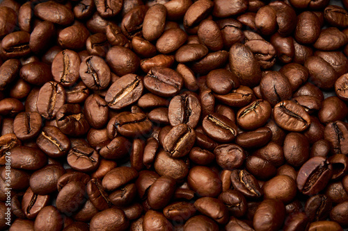 Roasted black coffee grains  can be used as background.