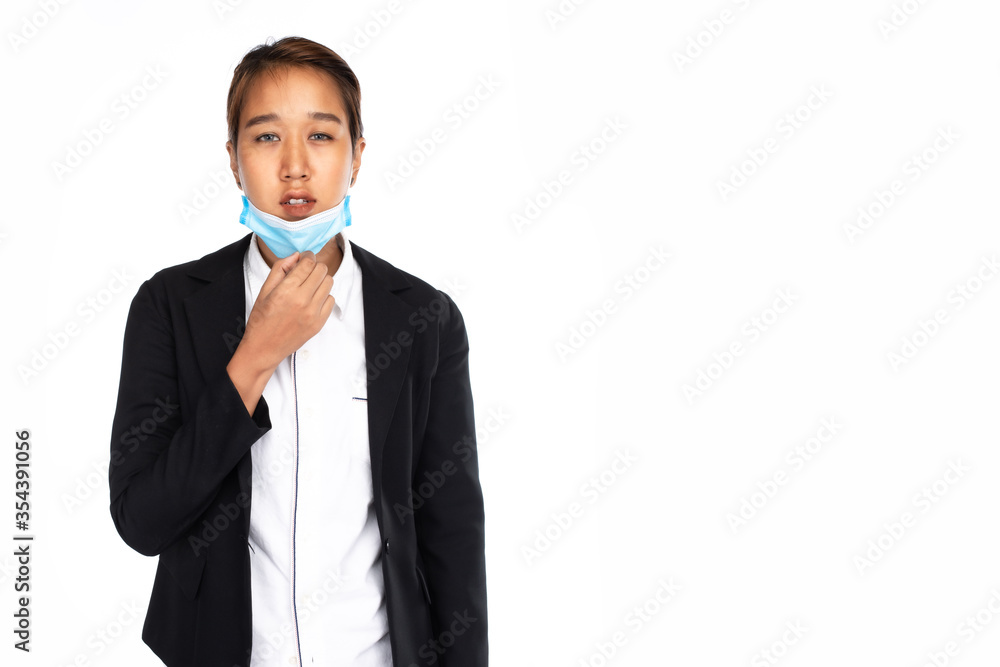 Asian businesswoman with formal black suit jacket take off surgical face mask for breathing, studio lighting isolated on white background, coronavirus, COVID19 concept Asian businesswoman with formal black suit jacket take off surgical face mask for breathing, studio lighting isolated on white background, coronavirus, COVID19 concept