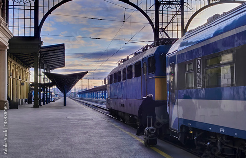Fotografie woman boarding  a train in a station