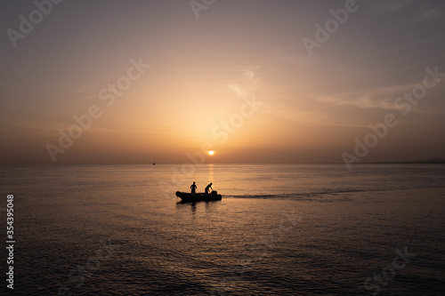 boat at sunset © Alejandro Cupi