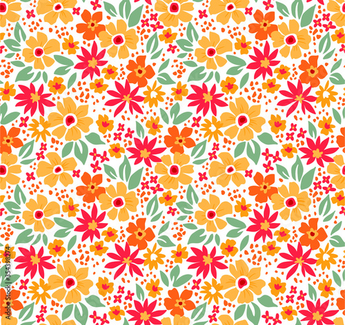 Cute floral pattern in the small flower. Ditsy print. Motifs scattered random. Seamless vector texture. Elegant template for fashion prints. Printing with small yellow flowers. White background. © ann_and_pen