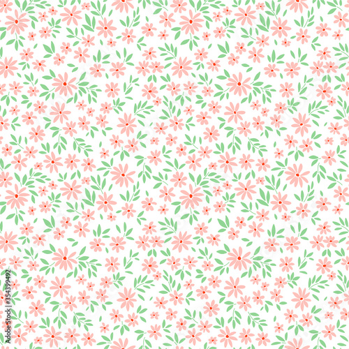 Cute floral pattern in the small flowers. Ditsy print. Seamless vector texture. Elegant template for fashion prints. Printing with small pale orange flowers. White background.