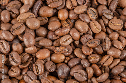 Roasted coffee beans top view. Great for texture and print.