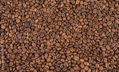 Roasted coffee beans top view. Great for texture and print.
