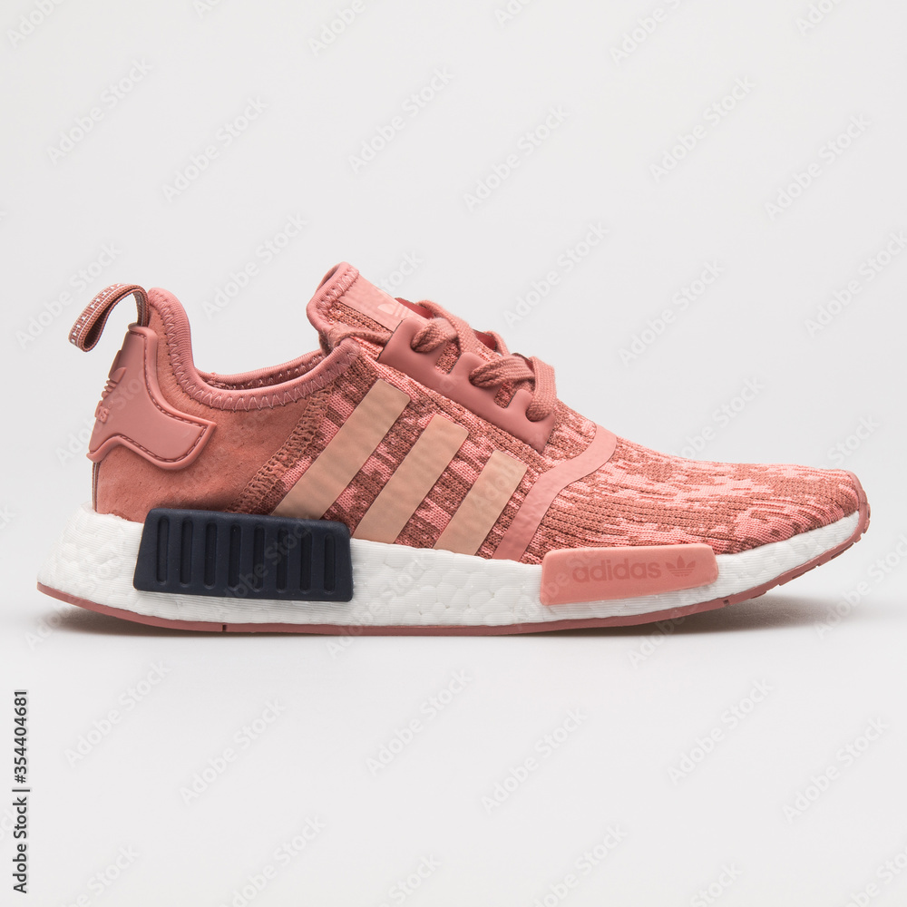 VIENNA, AUSTRIA - AUGUST 22, 2017: Adidas NMD R1 pink and white sneaker on  white background. Stock Photo | Adobe Stock
