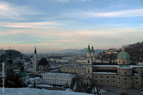 Aerial view of the city of Salzburg. The photo was taken in the winter  during the sunset and is possible to see Petersfriedhof.