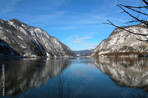 Perfect reflection on the water in Hallstätter See. The photo was taken in winter time in a sunny day. 