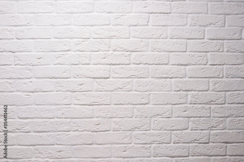 Texture of a white painted brick wall as a background or wallpaper wall ...