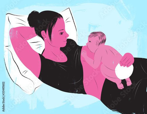 Фотография Mother breastfeeding her baby in the laid back position