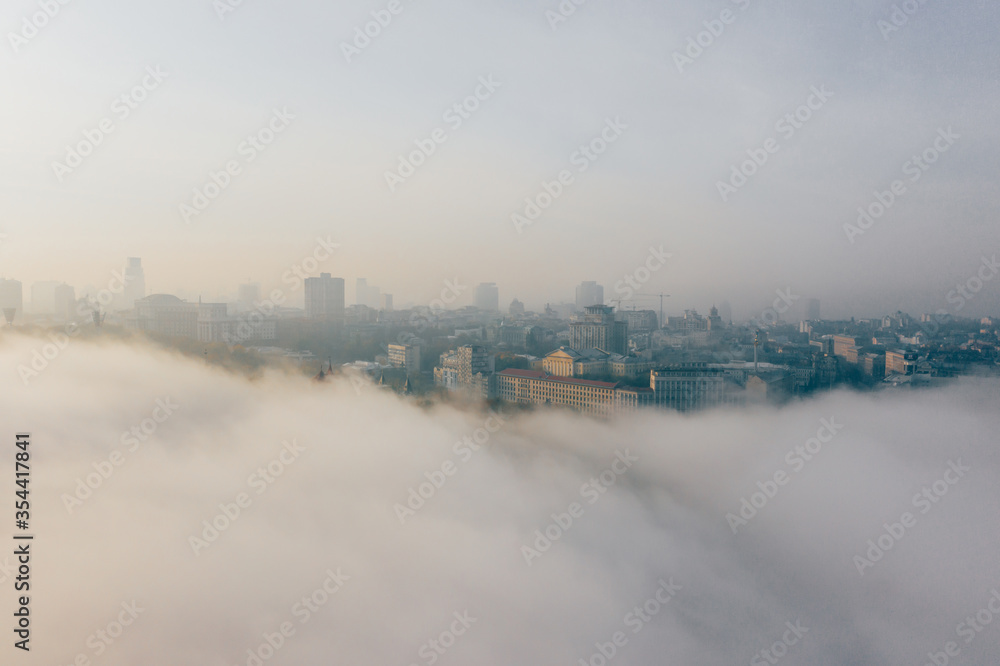 Aerial view of the city in the fog
