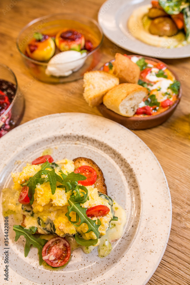 breakfast in a restaurant on a wooden table breakfast in a restaurant on a wooden table