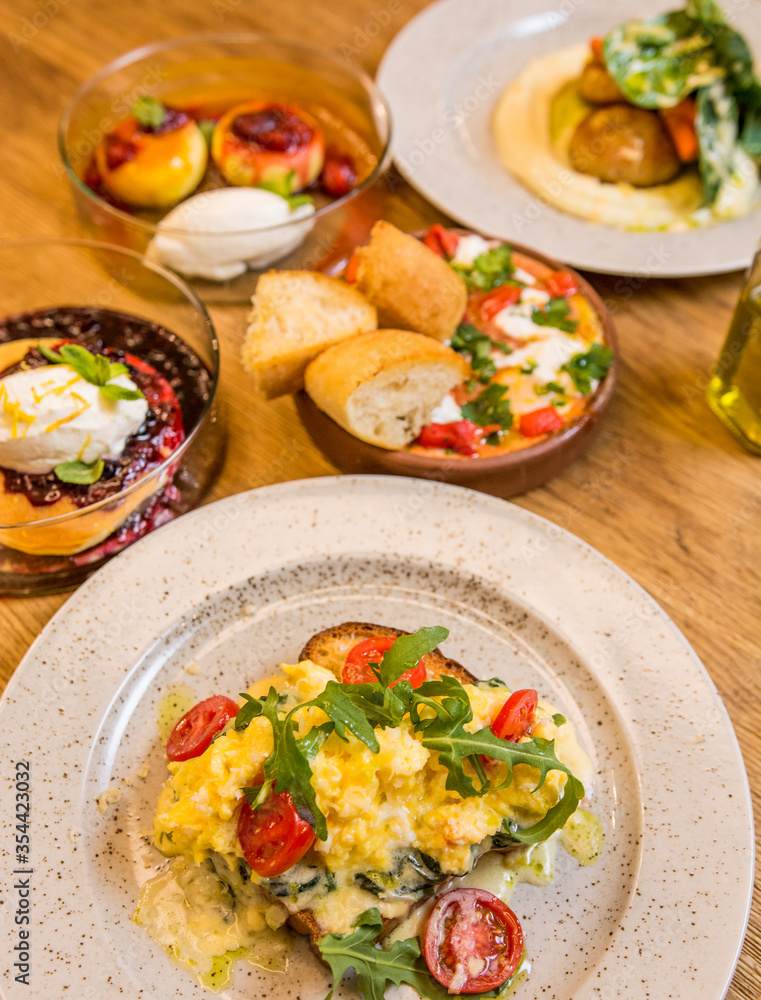 breakfast in a restaurant on a wooden table breakfast in a restaurant on a wooden table