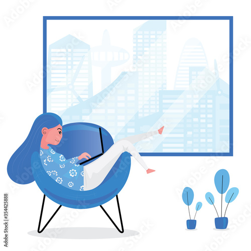 A lady is surfing internet by computer at home 