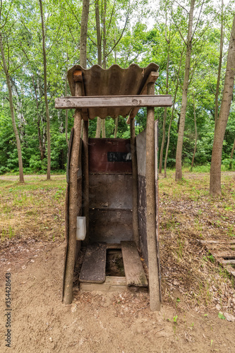 Temporary wooden WC. Toilet in nature