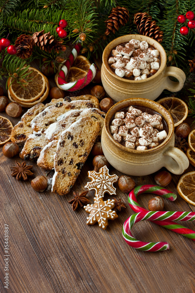 Christmas hot chocolate, gingerbread cookies and stollen on wooden background Christmas hot chocolate, gingerbread cookies and stollen on wooden background